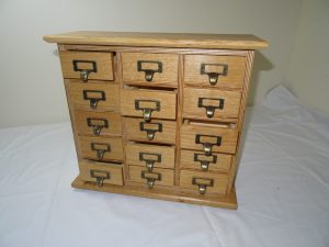 Oak clad apothecary drawers