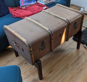 Antique suitcase stand in oak